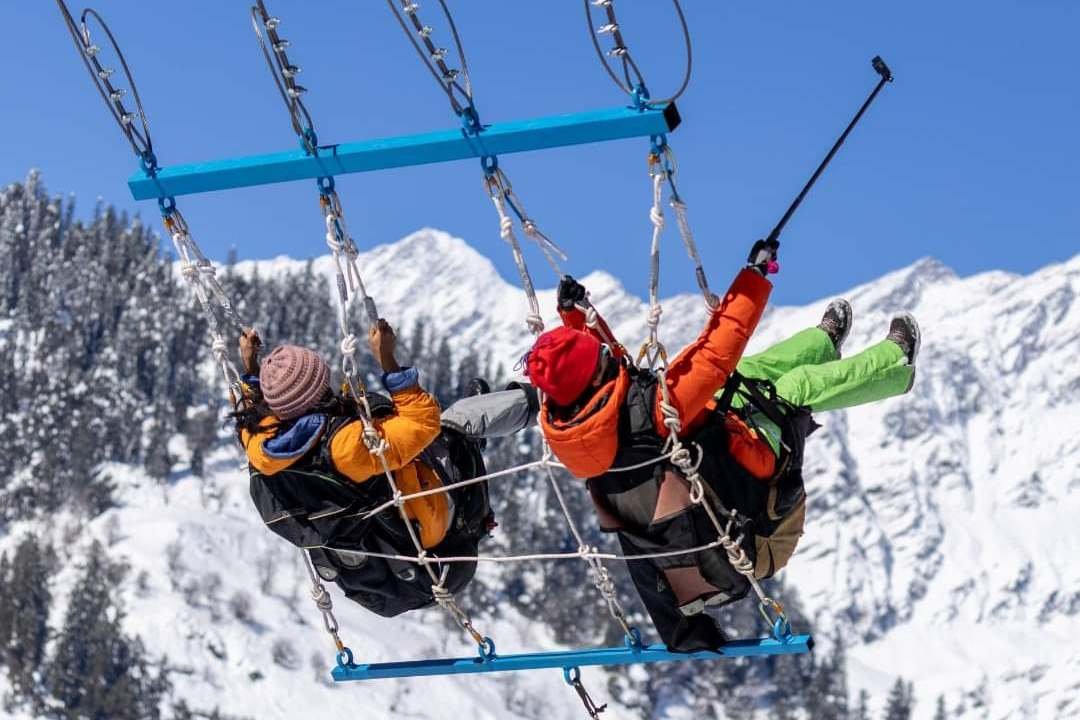 Couple giant swing in winter